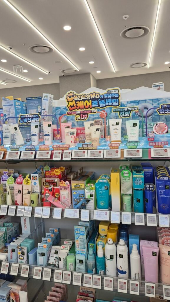 Sun care section inside an Olive Young store