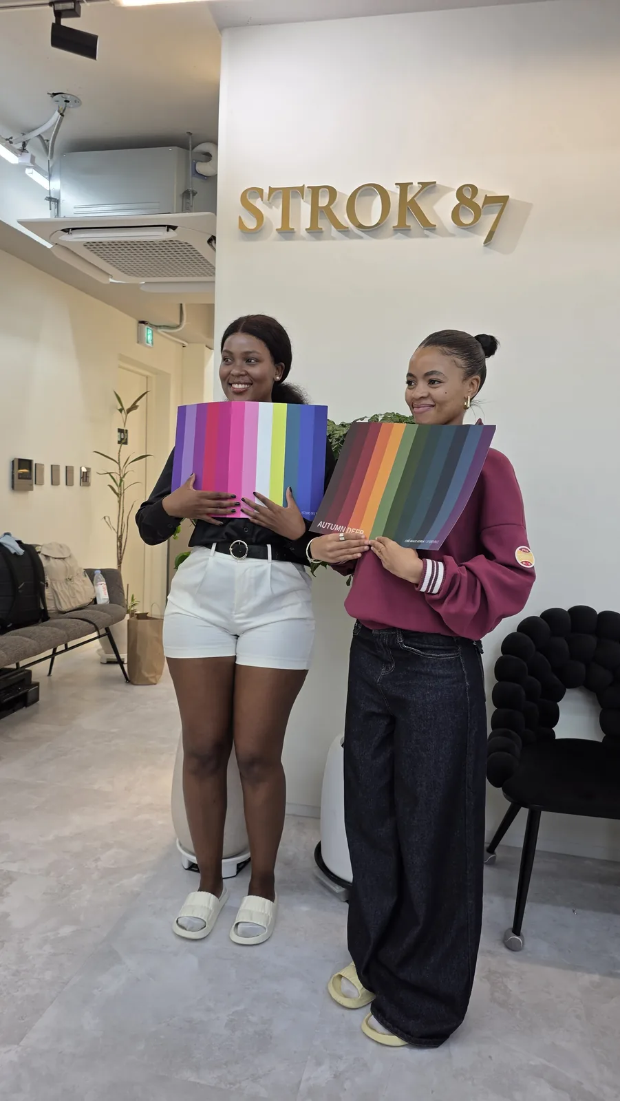 International guests holding different personal color palettes at STROK87